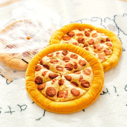 Yellow pizza slice dog chewing toy with teddy bear texture and squeaker