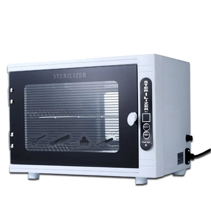 Small silver UV steriliser unit with stainless steel interior for sanitising beauty tools.