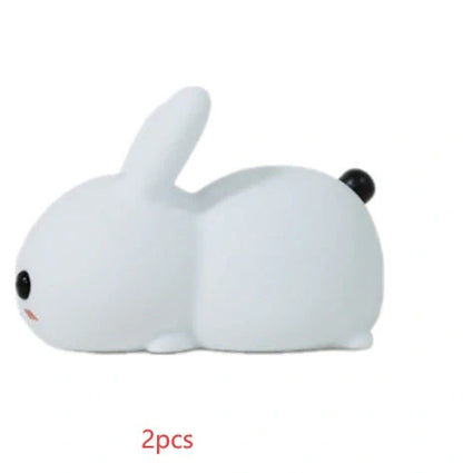 Rabbit-shaped silicone nightlight with warm amber and cool white dual colour illumination, perfect for bedside or home decor