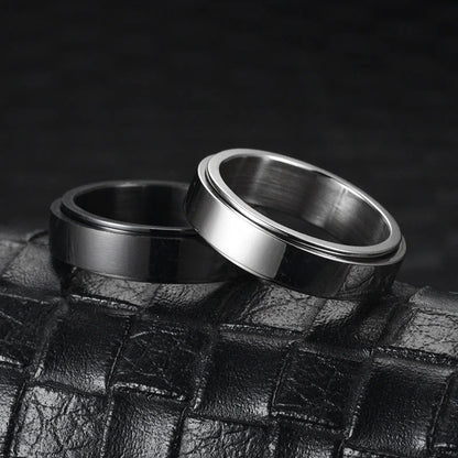 Rotatable stainless steel spinner ring with moon and star designs for anxiety relief and style