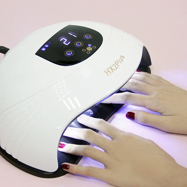 White nail phototherapy machine with LED display showing 60 lamp beads inside curing chamber