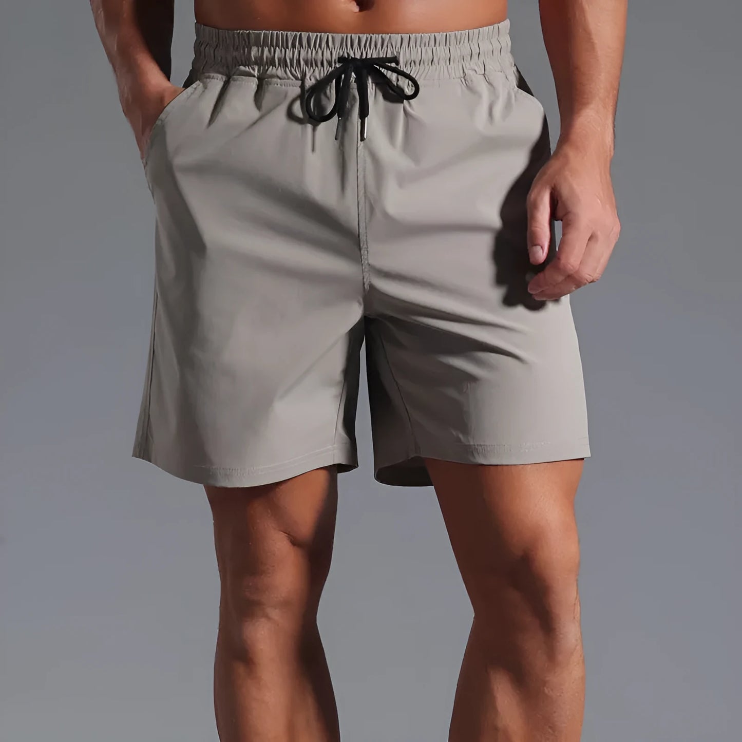 Men's loose-fitting casual shorts in quick-drying polyester available in four colours