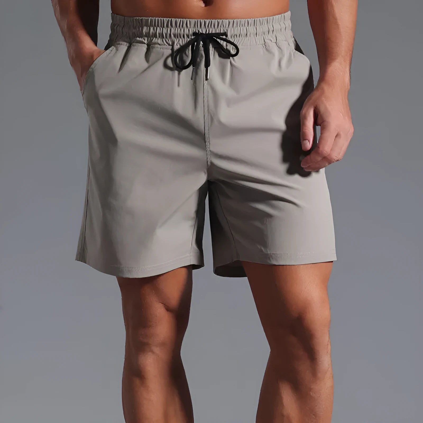 Men's loose-fitting casual shorts in quick-drying polyester available in four colours