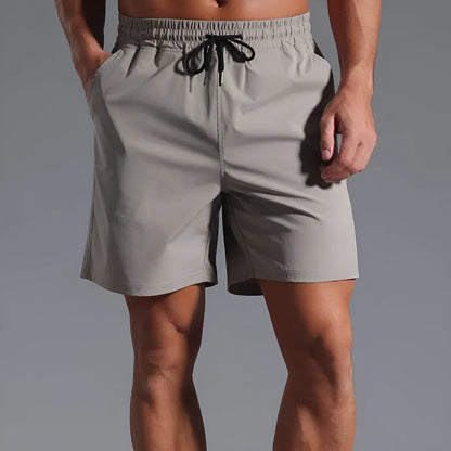 Men's loose-fitting casual shorts in quick-drying polyester available in four colours