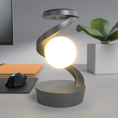 Stylish Rotating Moon Lamp with Wireless Phone Charging - Captivating Desk Accessory with Soothing Lighting and Convenient Wireless Charging