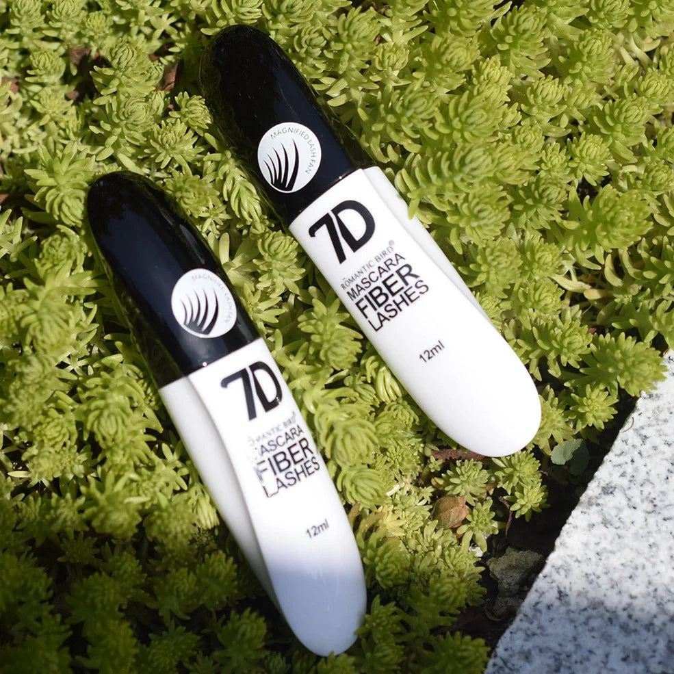 Black 7D mascara tube with brush showing separated lashes in waterproof formula