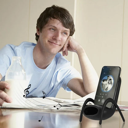 White portable mini chair wireless charger on desk with phone, showing compact 96.3mm size and fast charging