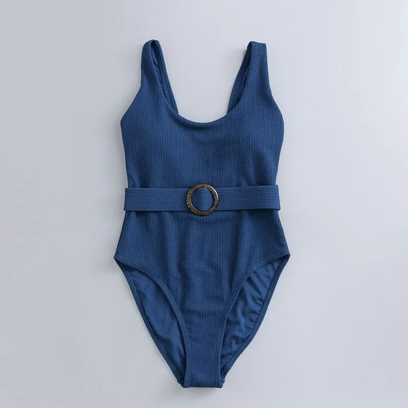 Navy blue women's one-piece swimsuit with slimming triangle design and chest pad for swimming