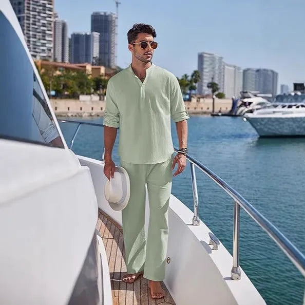 Men's casual cotton suit in a solid colour, featuring a long sleeve top and full-length trousers.