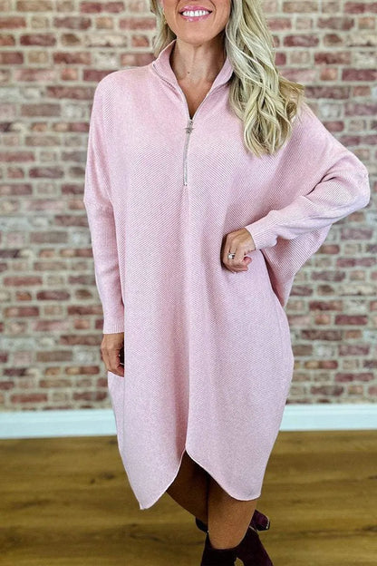 Women's solid colour loose knitted dress with a front zipper and raglan sleeves.
