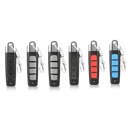 Rolling door remote control transmitter in four colour options showing compact 6.7cm design
