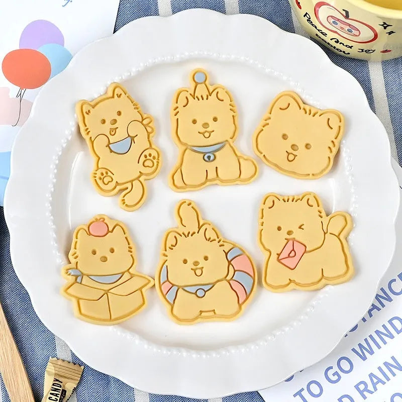 Three-dimensional puppy biscuit mould showing raised details for creating themed baked goods with seven design options