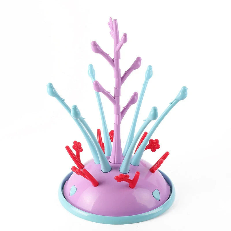 Portable baby bottle drying rack in green and purple, made from safety PP material