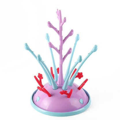 Portable baby bottle drying rack in green and purple, made from safety PP material