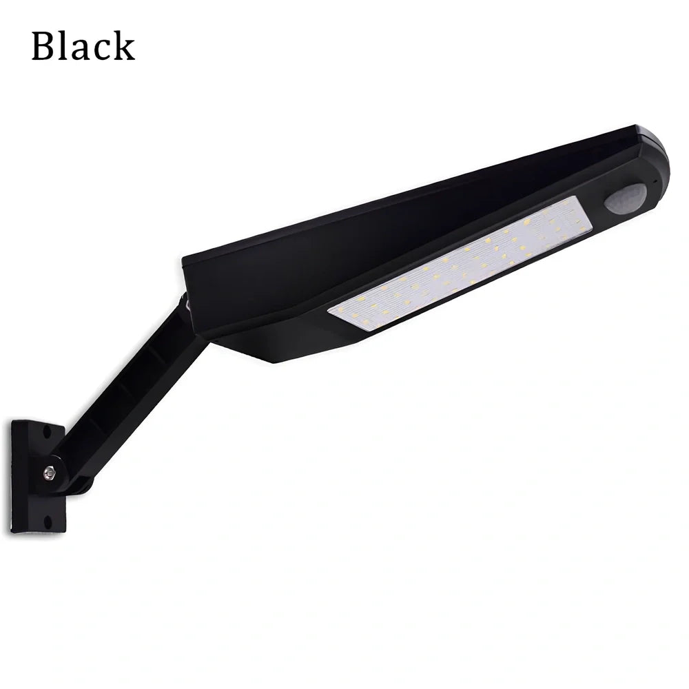 Adjustable solar light with motion sensor showing black or white colour options