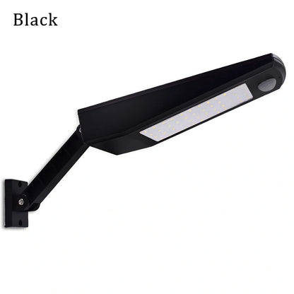Adjustable solar light with motion sensor showing black or white colour options