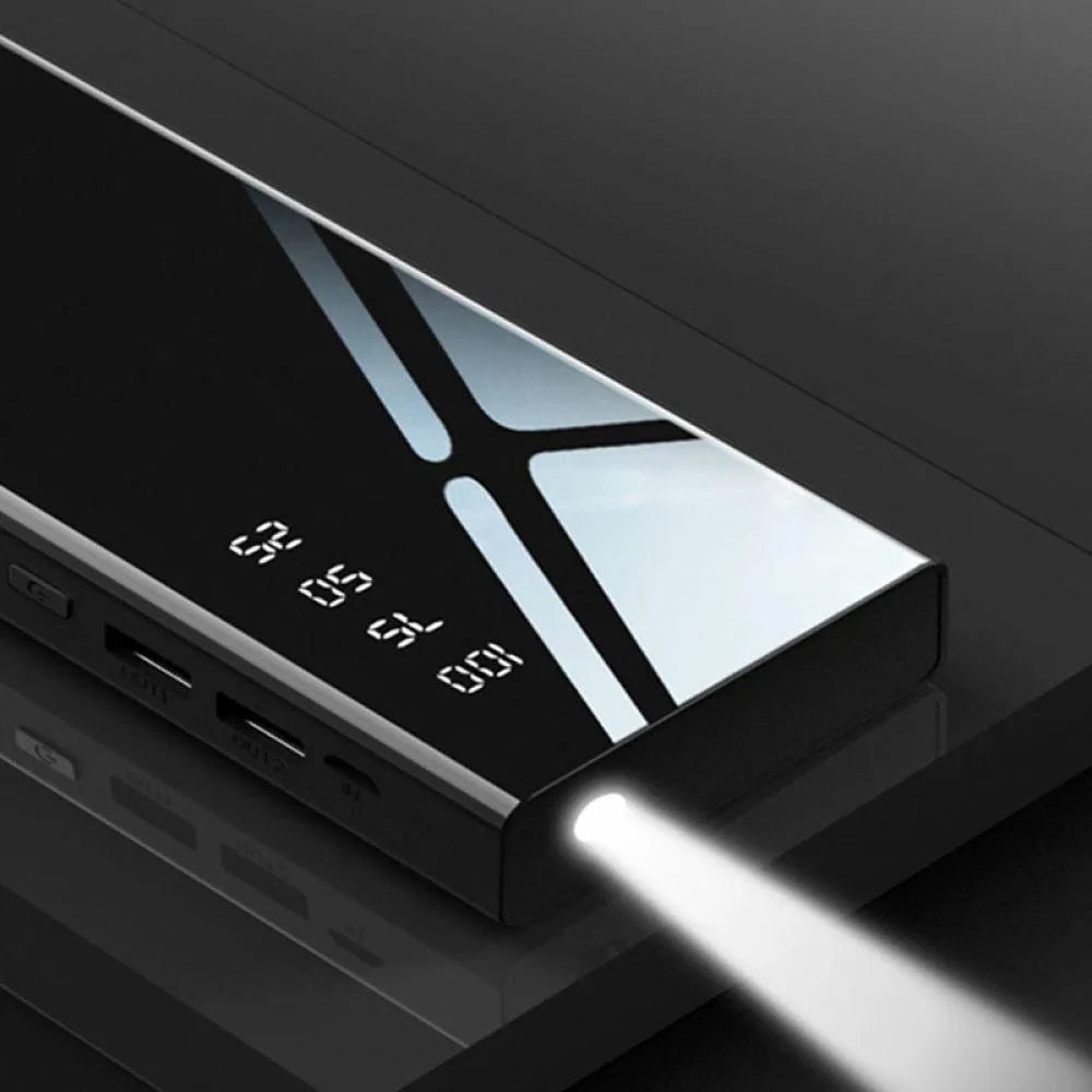 20000mAh power bank with LCD display showing battery percentage, measuring 140mm x 63mm x 22mm