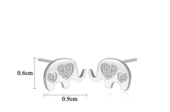 Silver geometric drop earrings measuring 0.6cm by 0.9cm with gem setting detailing