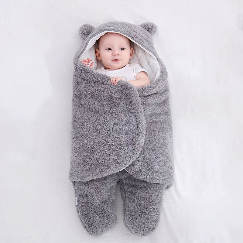 Cozy cotton baby sleeping bag with soft, breathable interior and warm, insulating outer layer