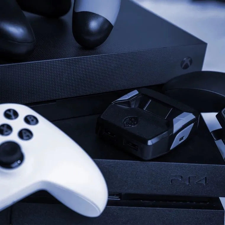 Black plastic wireless controller converter for Xbox One and PS4 gamepads to PC