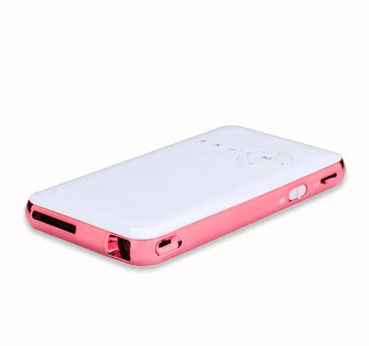 White and rose gold M6S miniature portable Android projector showing compact dimensions next to smartphone for scale
