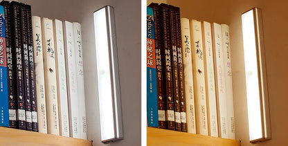 Wireless LED wardrobe light in 300mm size with motion sensor and charging pad, warm white glow, mounted on shelf