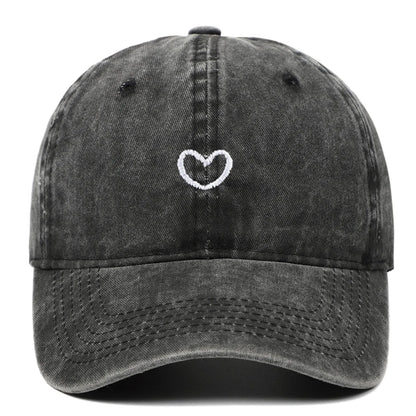 Retro-style baseball cap with colourful machine embroidery on a soft cotton dome crown, shown in a wine red colour.