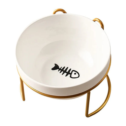 White ceramic pet bowl with cat paw print in a black iron stand with cat ear details