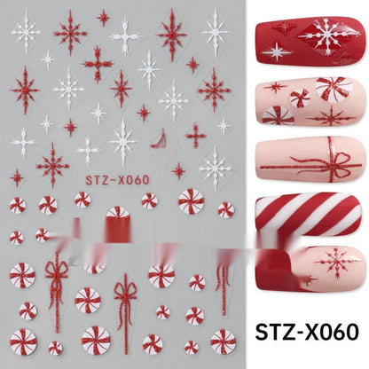 Assortment of black and silver nail sticker designs including cartoon and French tip patterns on a plastic sheet.
