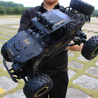 Four-wheel drive remote control car with 2.4G wireless controller on rough terrain