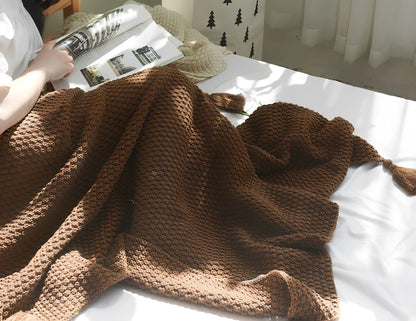 Fringed knitting blanket in beige colour showing 5cm fringe detailing and dense acrylic weave texture