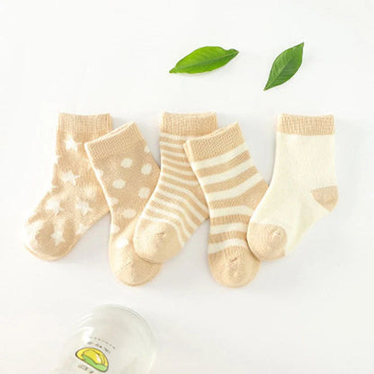 Cotton tube child socks in various colors and sizes, featuring breathable and sweat-absorbing properties