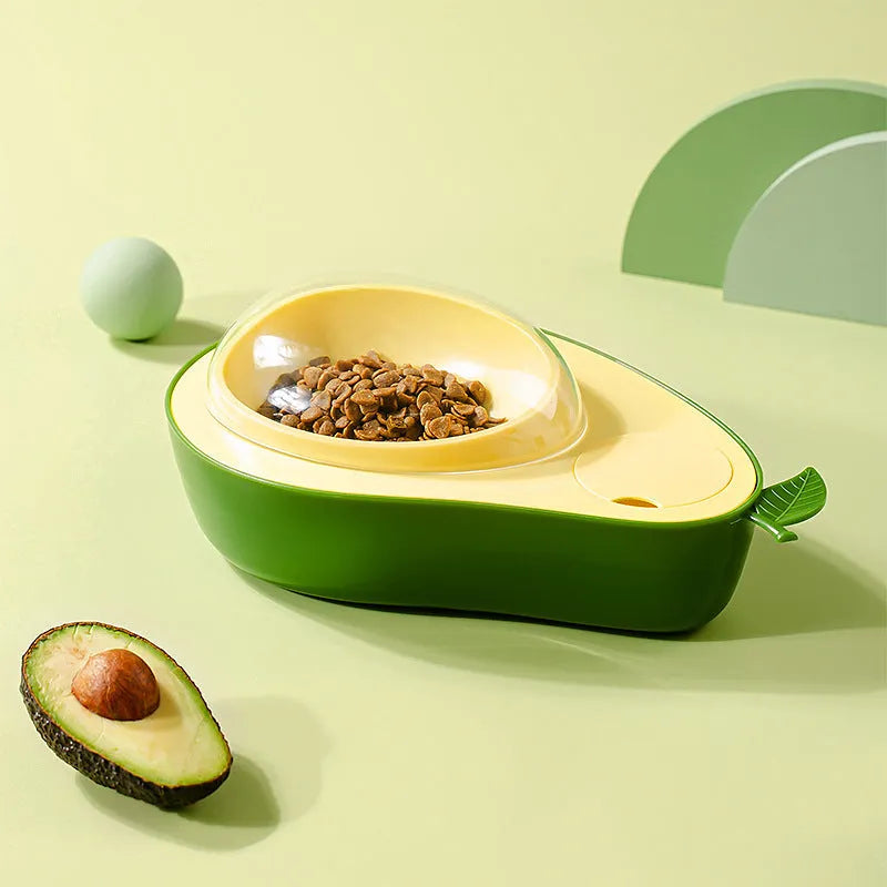 Avocado-shaped pet feeder with automatic water dispenser bottle and slow feed bowl in green colour
