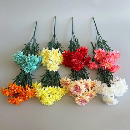 Desktop fan-shaped display holding artificial silk flowers in rose and peony varieties with colourful petals