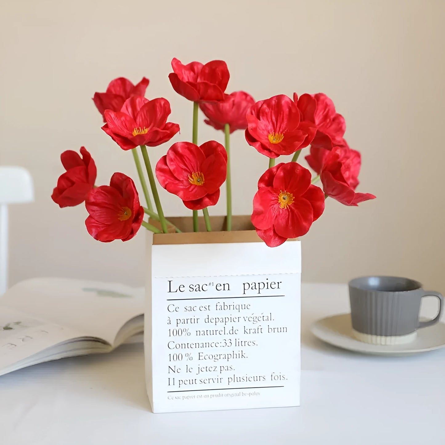 Pack of 15 mini artificial poppy flowers in assorted colours including purple, pink, yellow and red.