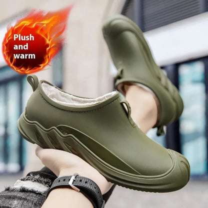 Men's short casual rain boot in solid colour, plastic upper, shown on foot.