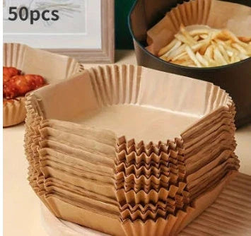 Disposable air fryer liners made from high-quality parchment paper, designed to keep your air fryer clean and your meals healthy