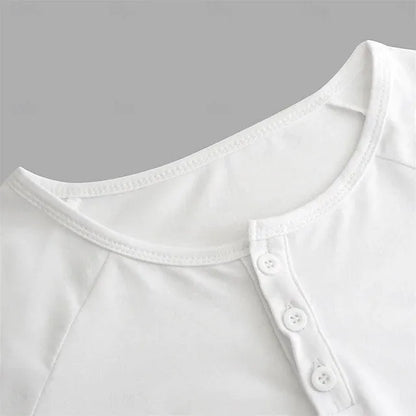 Men's white long-sleeved t-shirt with a Henry collar laying flat