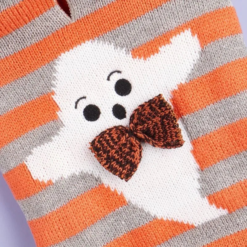 Orange knitted pet sweater with striped fur ball decoration and hood for small dog or cat.