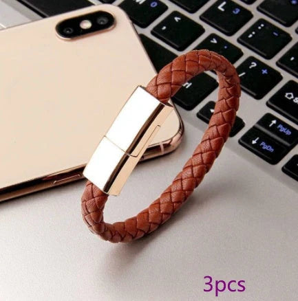 Stylish leather bracelet with built-in charging cable for smartphones and USB-C devices