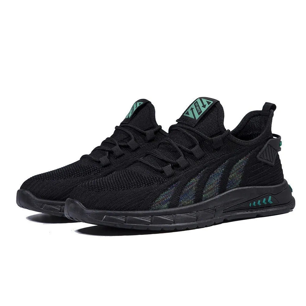 Low-top casual sneakers with striped mesh upper and flat plastic sole in grey colour.