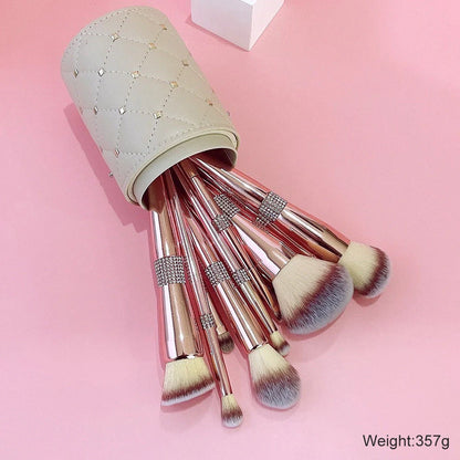 Rose gold electroplated makeup brush set with 14 pieces showing 20cm length and PU storage bag