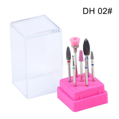 Set of six tungsten steel nail drill bits and a brush in a clear plastic case.