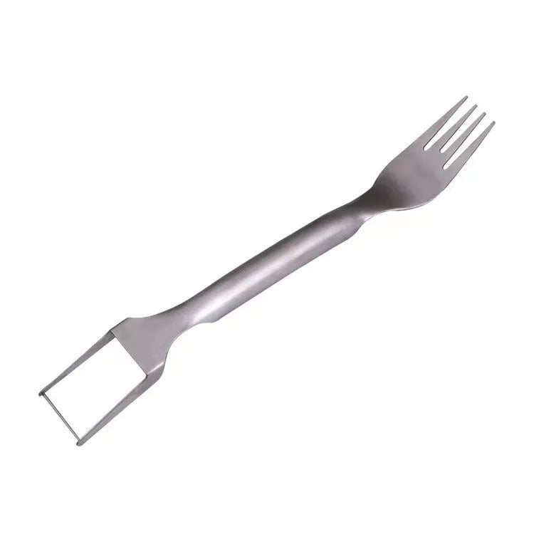 Stainless steel watermelon slicer and serving fork on a kitchen counter.