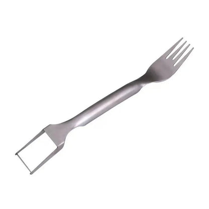 Stainless steel watermelon slicer and serving fork on a kitchen counter.