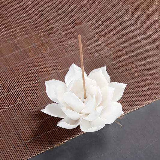 White porcelain lotus-shaped incense burner with handmade ceramic construction measuring 4-10cm