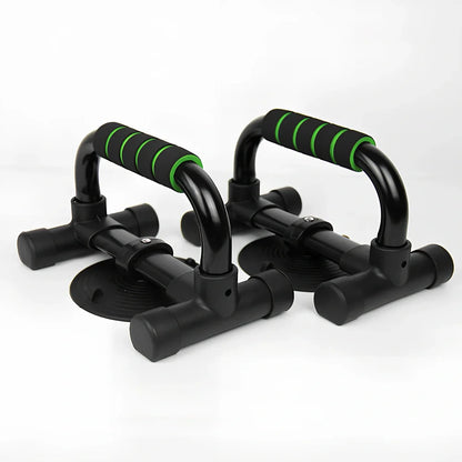 Green suction cup push-up bracket with electroplated steel frame and foam grips, supporting 300kg for chest training on floors