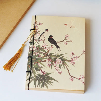 A5 antique wire-bound notebook with classical artwork cover, black oil wax rope binding, and decorative tassels