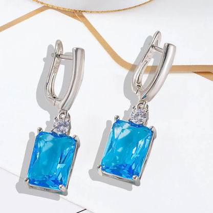 Square geometric earrings with gold electroplated finish on copper base