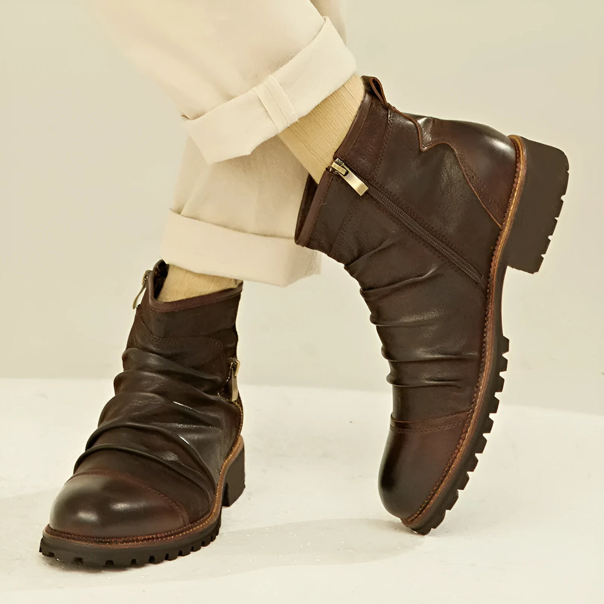 Black mid-calf cowboy boots with side zipper, round toe, and a horseshoe-shaped heel.